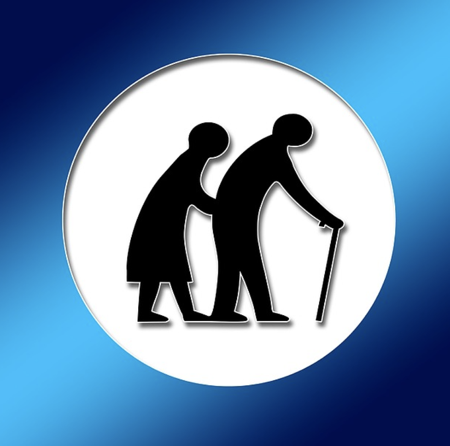 Image of an older couple walking with a cane